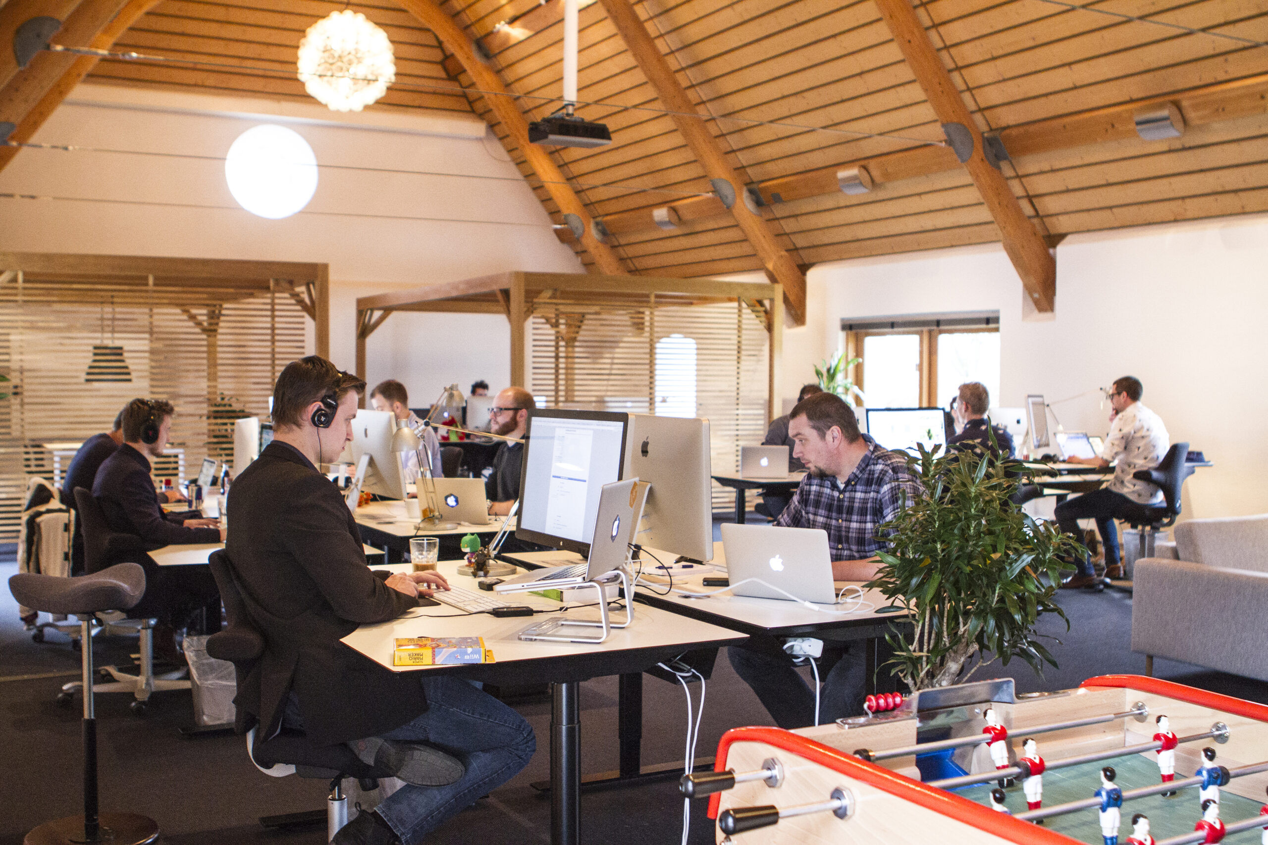 Image showing Vaimo Support as a Service team members assisting customers.